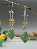 Mechanical Swing Arm Long Earrings