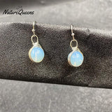 Round winding opal earrings